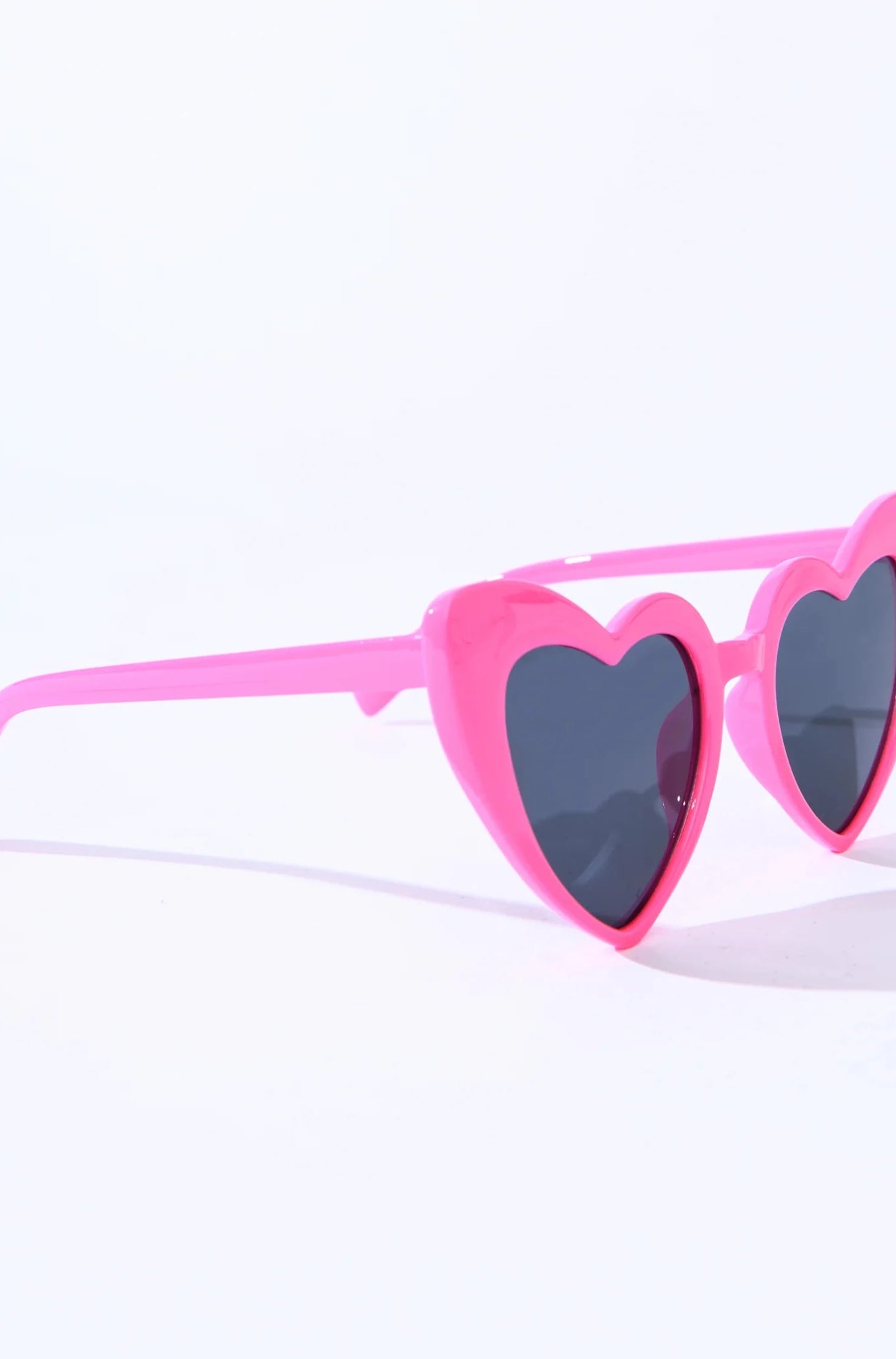 Shop Unique Vintage Unique Vintage x Barbie Hot Pink Heart Frame Sunglasses Sunglasses for women – premium loungewear and festival fashion at Spoiled Brat