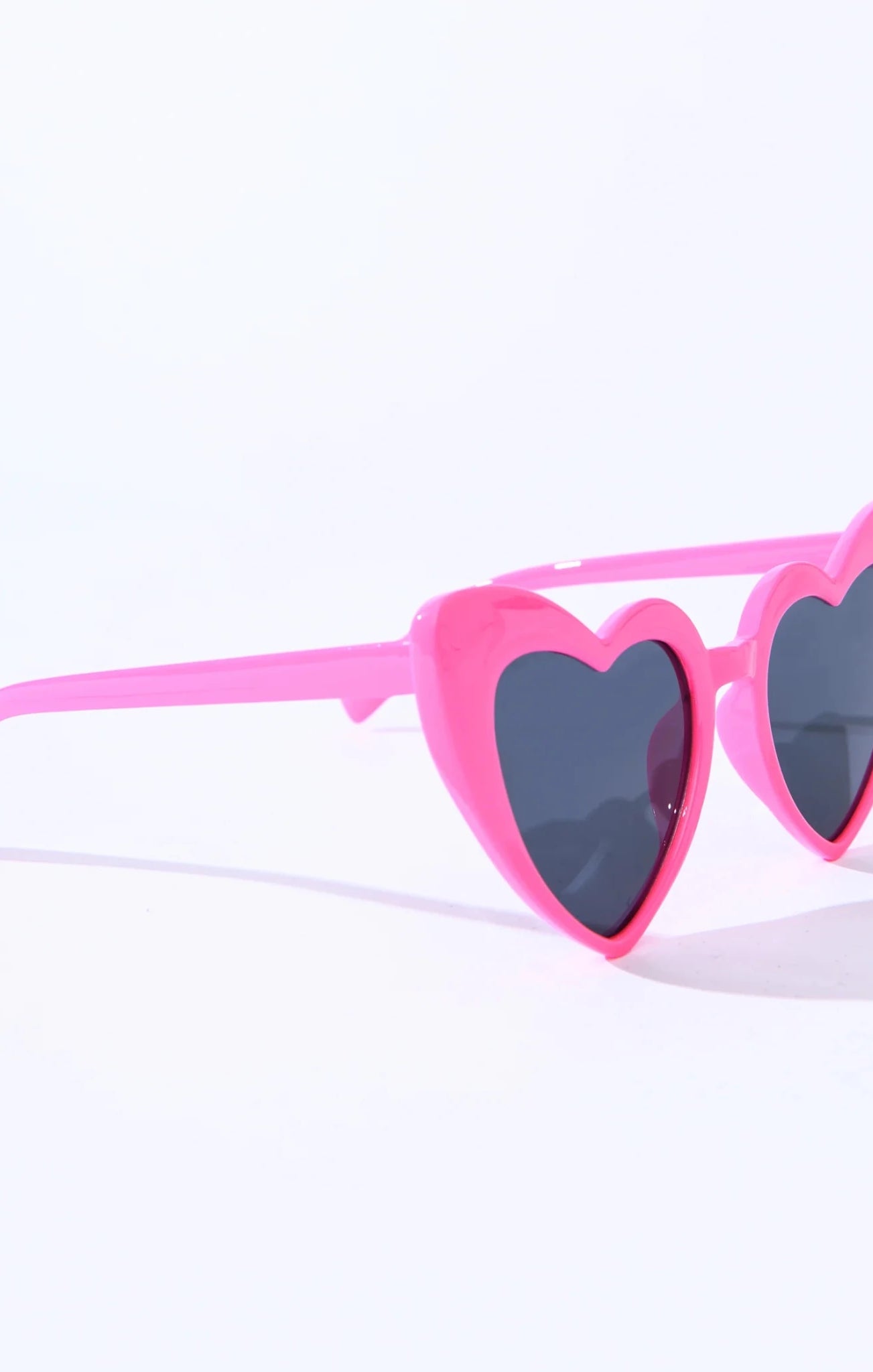 Shop Unique Vintage Unique Vintage x Barbie Hot Pink Heart Frame Sunglasses Sunglasses for women – premium loungewear and festival fashion at Spoiled Brat
