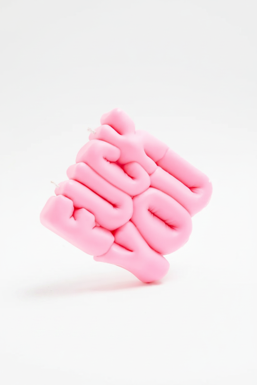 Pink textured CANDLE on a white background