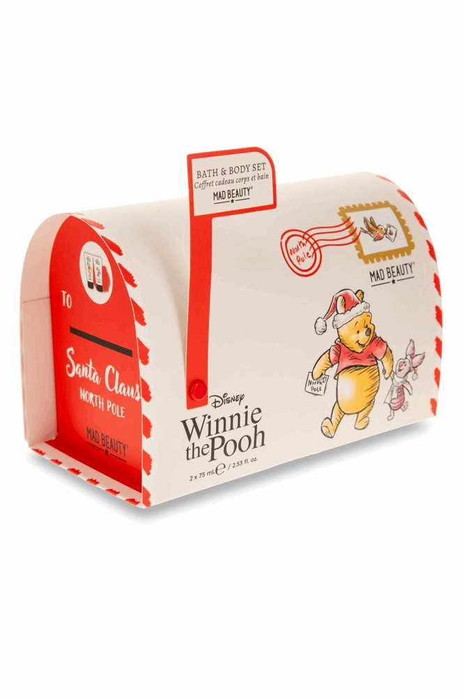 Winnie the Pooh-themed bath and body set packaging on a white background