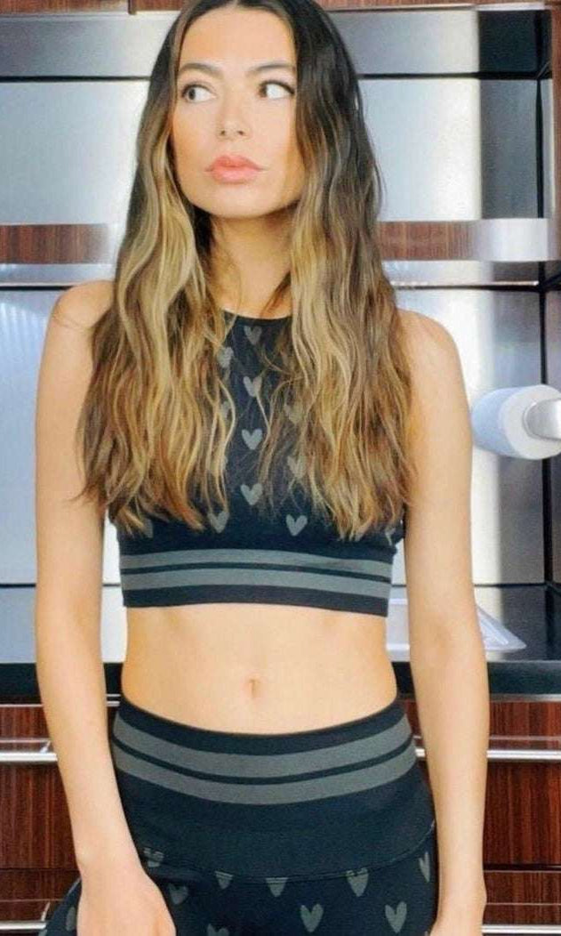 Shop Spiritual Gangster Spiritual Gangster High Neck Jacquard Seamless Black Sports Bra as seen on Miranda Cosgrove Vest Top for women – premium loungewear and festival fashion at Spoiled Brat