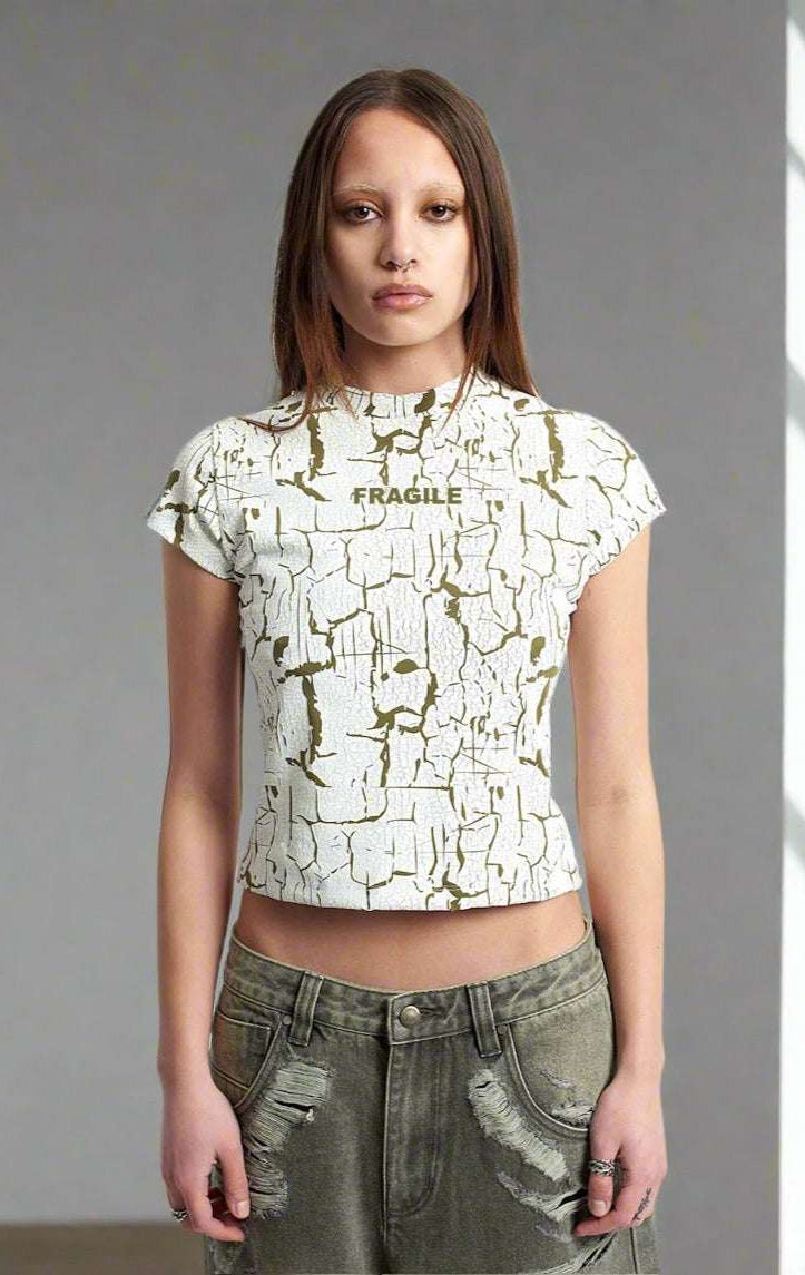 The Ragged Priest Rift Baby Tee Top by The Ragged Priest as seen on celebrities