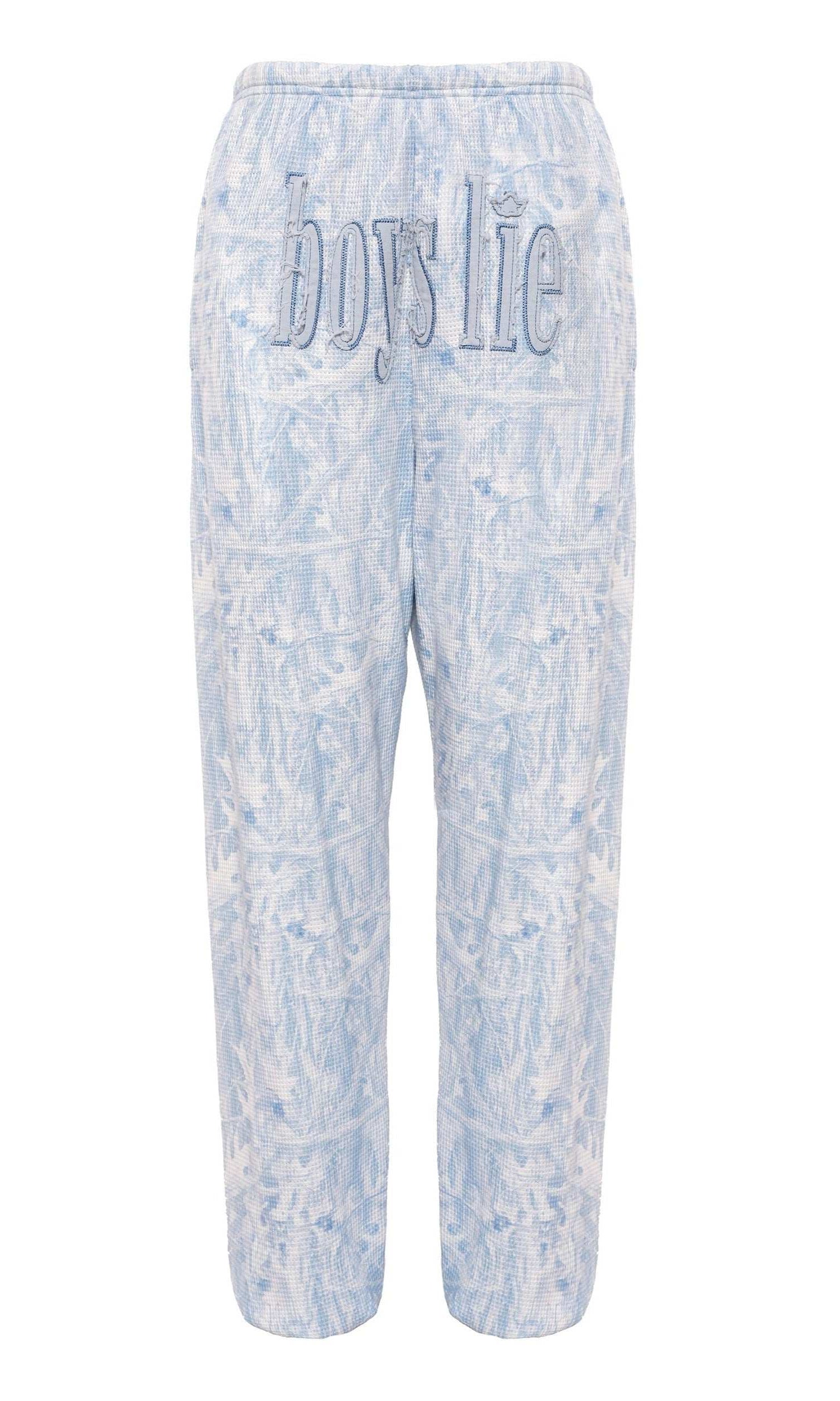 Light blue tie-dye pants with 'Boys Lie' text on a white background