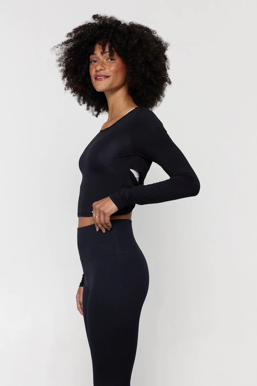 Spiritual Gangster Femme Twist Back Long Sleeve Top Tank Top by Spiritual Gangster as seen on celebrities