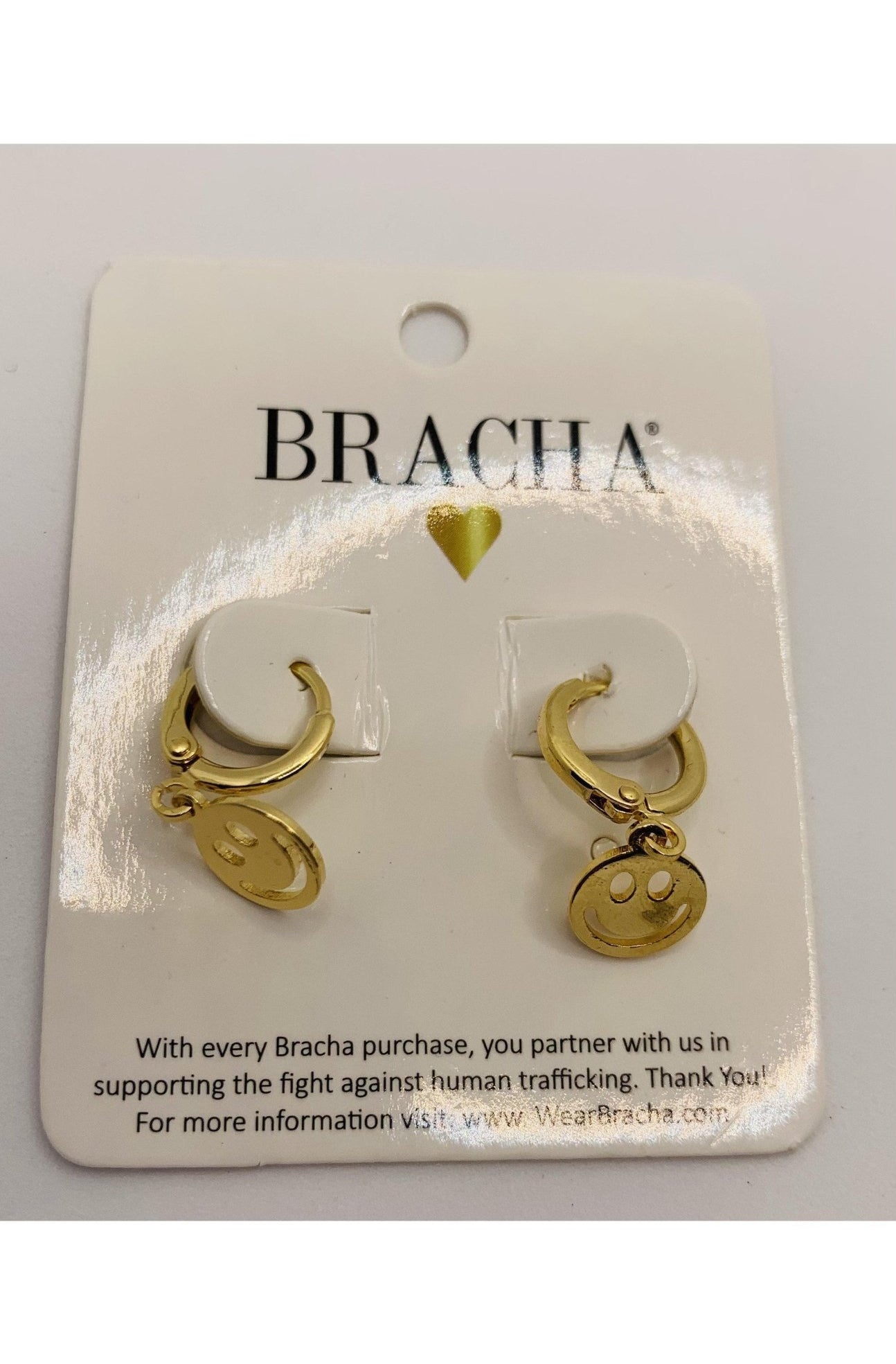 Shop Bracha Bracha Smiley Huggies Gold Hoop Earrings Earrings for women – premium loungewear and festival fashion at Spoiled Brat