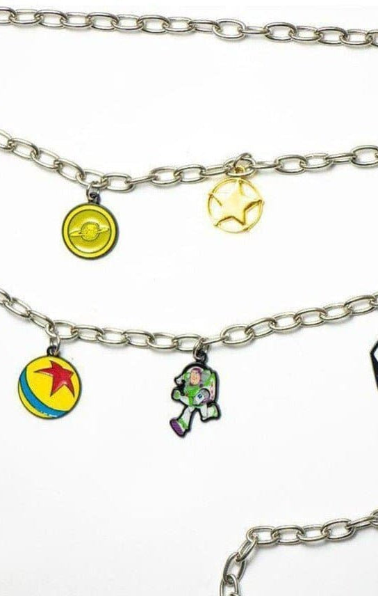 Shop Buckle Down Products Buckle Down Products Disney Toy Story Charm Chain Belt Belt for women – premium loungewear and festival fashion at Spoiled Brat