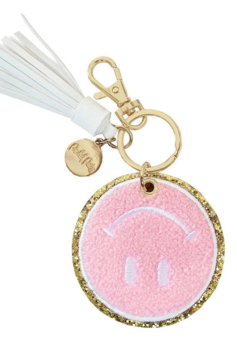 Packed Party Keep Cozy Smiley Keychain by Packed Party – Keyring – Pink | Spoiled Brat UK