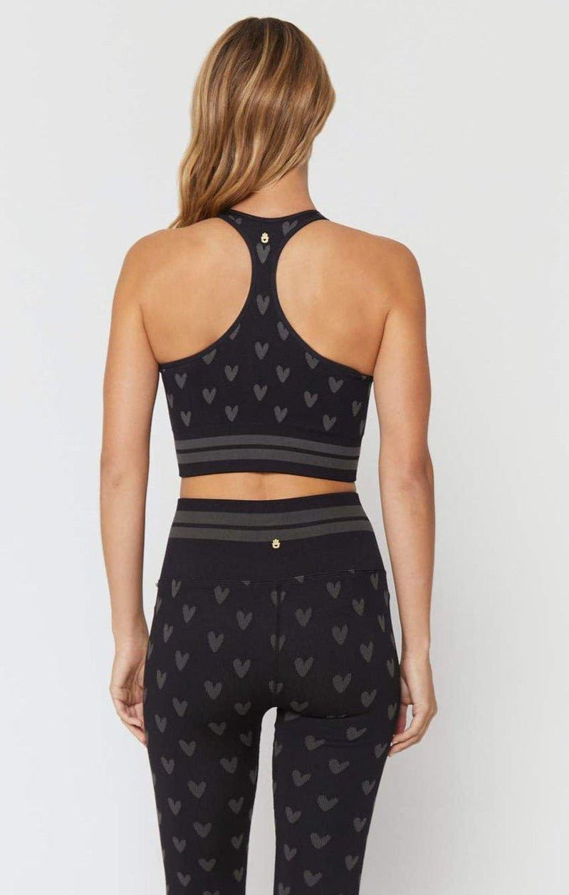 Shop Spiritual Gangster Spiritual Gangster High Neck Jacquard Seamless Black Sports Bra as seen on Miranda Cosgrove Vest Top for women – premium loungewear and festival fashion at Spoiled Brat