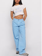 Samii Ryan x Smileyworld® Good Days Baby Tee T-Shirt by Samii Ryan as seen on celebrities