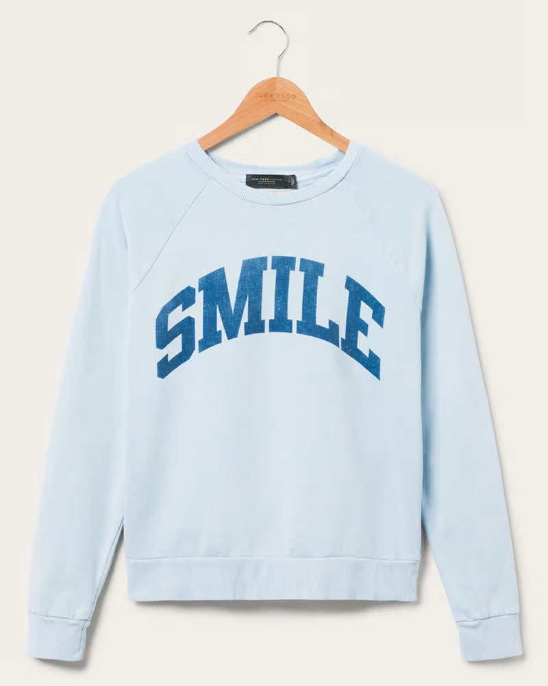 Shop Junk Food Junk Food Womens Smile Vintage Raglan Pullover online at Spoiled Brat