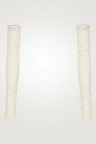 Two cylindrical glass vases with textured surfaces on a white background