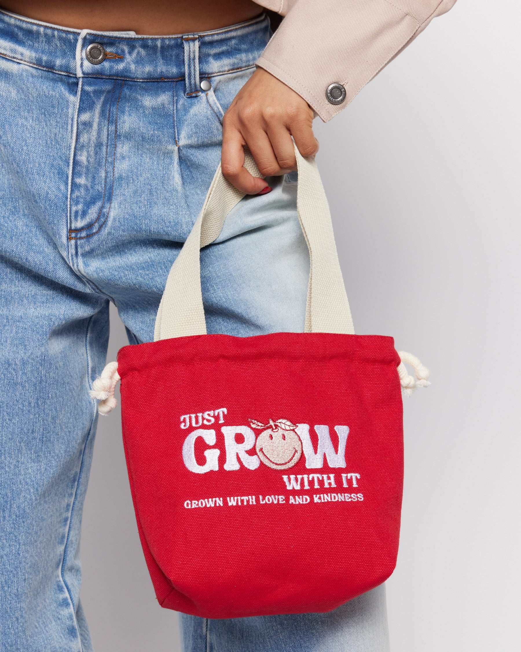 Samii Ryan x Smiley® Just Grow With It Bucket Bag Clutch Bag by Samii Ryan as seen on celebrities