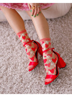 Shop Sock Candy Sock Candy Strawberry Daisy Ruffle Sheer Crew Sock as seen on Chrissy Teigen online at Spoiled Brat