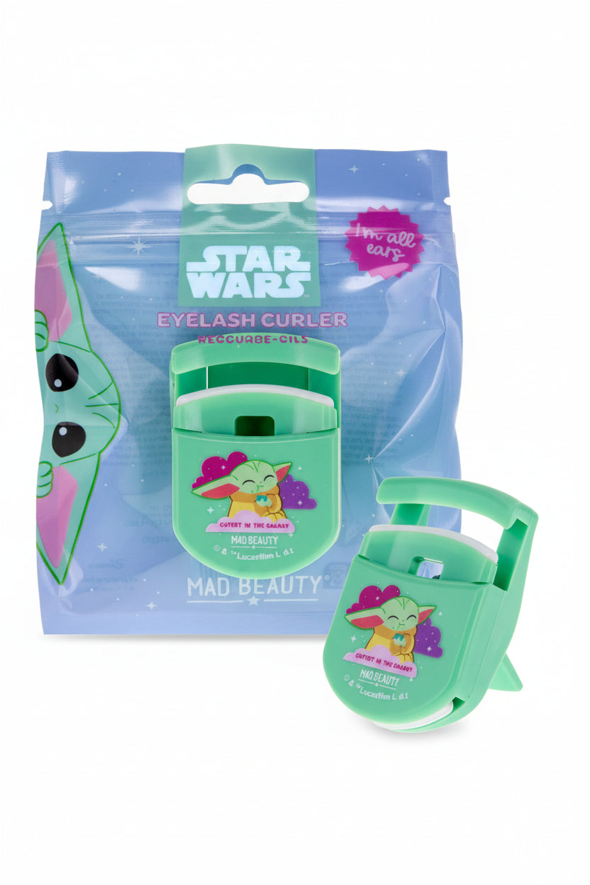 Green eyelash curler with 'Star Wars' branding and packaging on a white background