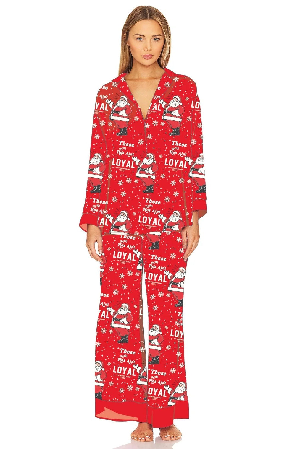 Woman wearing a red pajama set with festive pattern on a white background