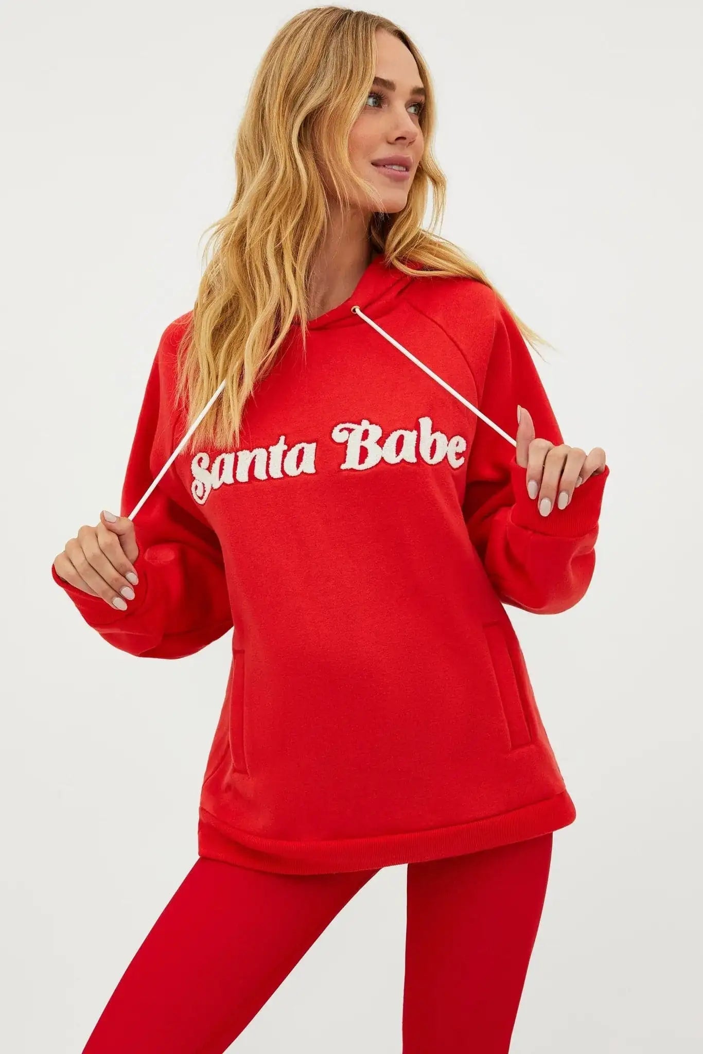 Shop Beach Riot Beach Riot Alissa Santa Babe Hooded Sweater as seen on Una Healy Sweater for women – premium loungewear and festival fashion at Spoiled Brat