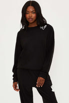 Shop Beach Riot Beach Riot Devyn Boo Black Sweatshirt Sweater for women – premium loungewear and festival fashion at Spoiled Brat