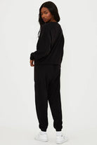 Shop Beach Riot Beach Riot Devyn Boo Black Sweatshirt Sweater for women – premium loungewear and festival fashion at Spoiled Brat