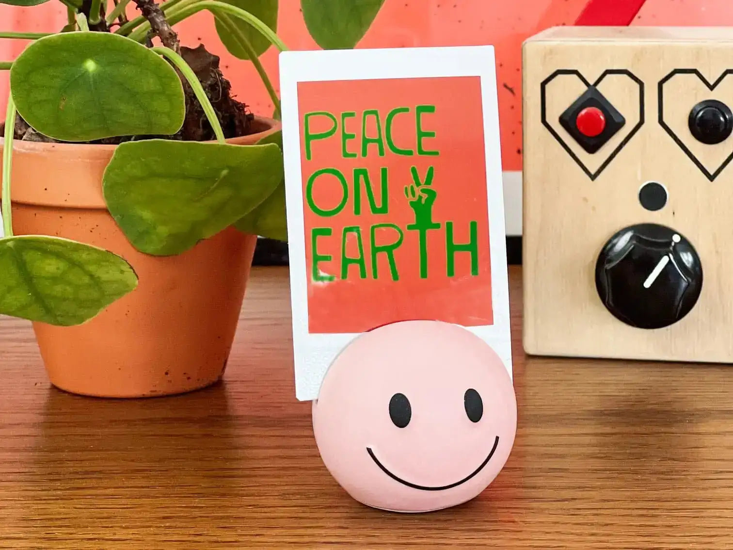 Bitten Happy Sad Mood Photo Holder Planter by Bitten as seen on celebrities