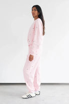 Shop Brunette The Label Brunette The Label "Be Kind" All Over Floral Perfect Crew Sweater Sweater for women – premium loungewear and festival fashion at Spoiled Brat