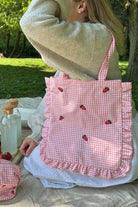 Shop Coconut Lane Coconut Lane Strawberry Picnic Tote Bag Tote Bag for women – premium loungewear and festival fashion at Spoiled Brat