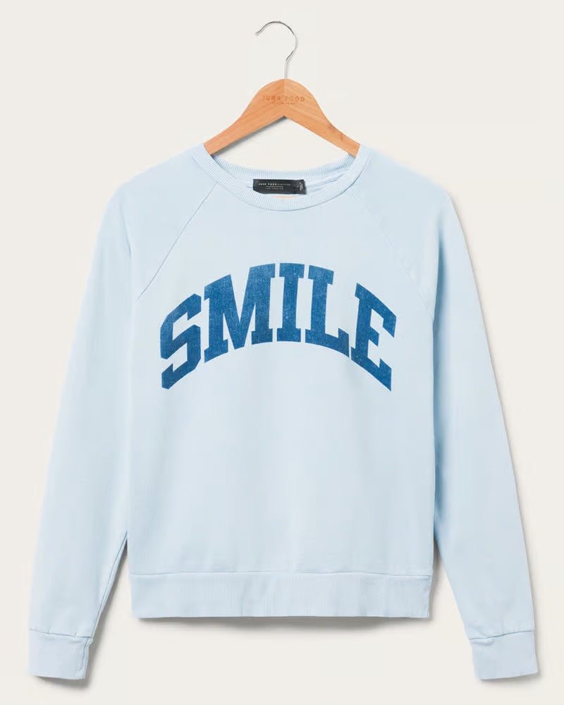 Shop Junk Food Junk Food Womens Smile Vintage Raglan Pullover T-Shirt for women – premium loungewear and festival fashion at Spoiled Brat