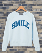 Shop Junk Food Junk Food Womens Smile Vintage Raglan Pullover T-Shirt for women – premium loungewear and festival fashion at Spoiled Brat