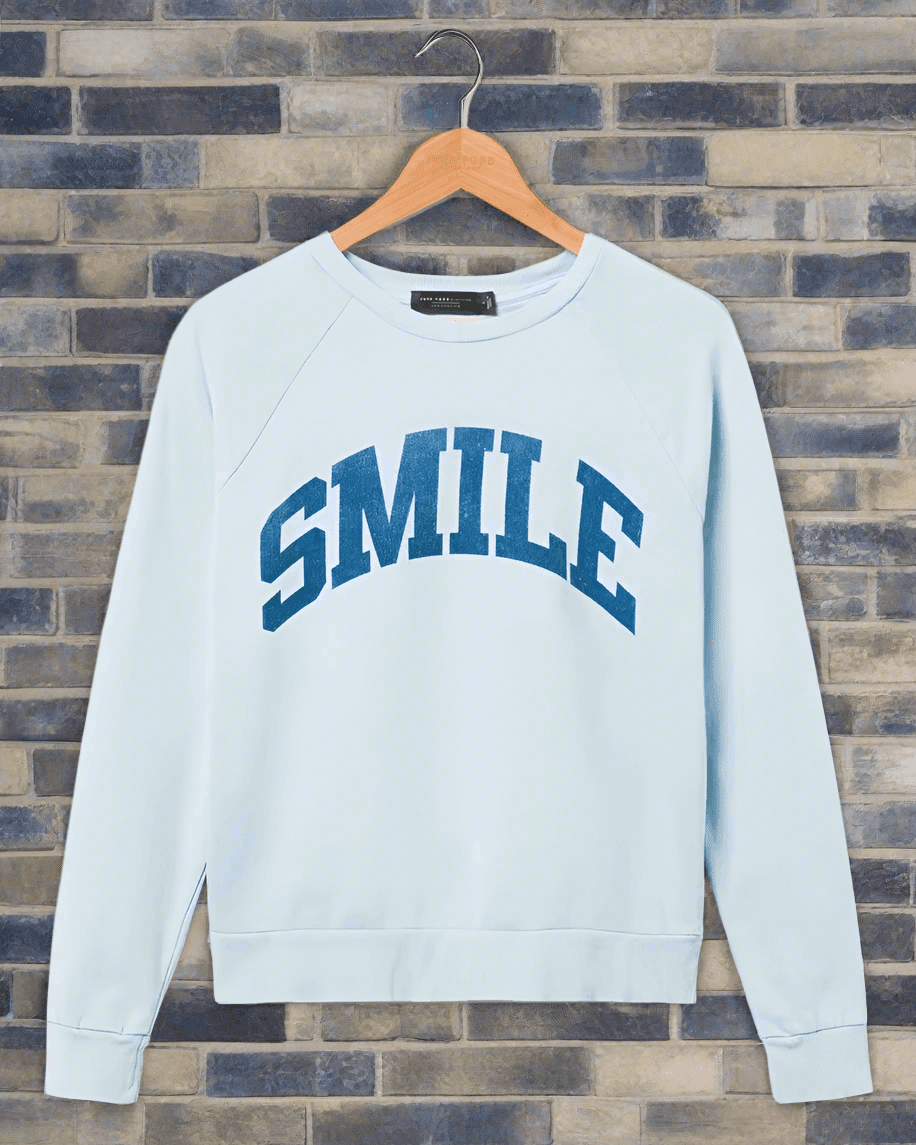 Shop Junk Food Junk Food Womens Smile Vintage Raglan Pullover T-Shirt for women – premium loungewear and festival fashion at Spoiled Brat