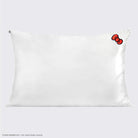 Shop Kitsch Hello Kitty x Kitsch Satin Pillowcase - Solid Ivory Hello Kitty Bow Pillow for women – premium loungewear and festival fashion at Spoiled Brat