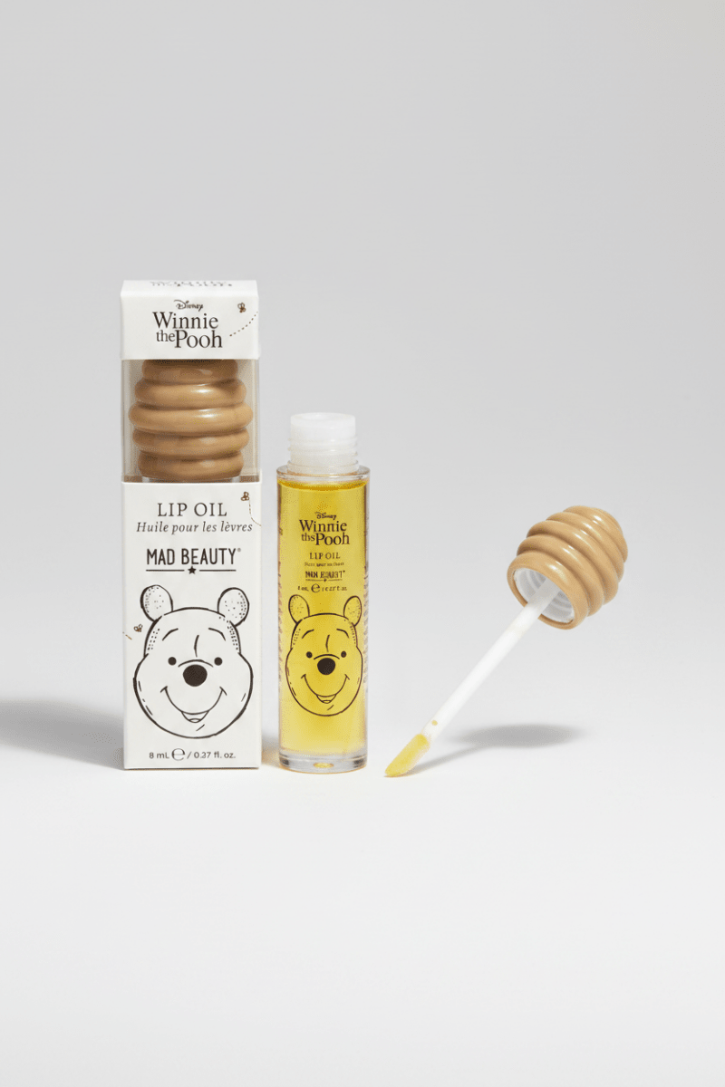Shop Mad Beauty Mad Beauty Winnie The Pooh Lip Oil Lip Gloss for women – premium loungewear and festival fashion at Spoiled Brat