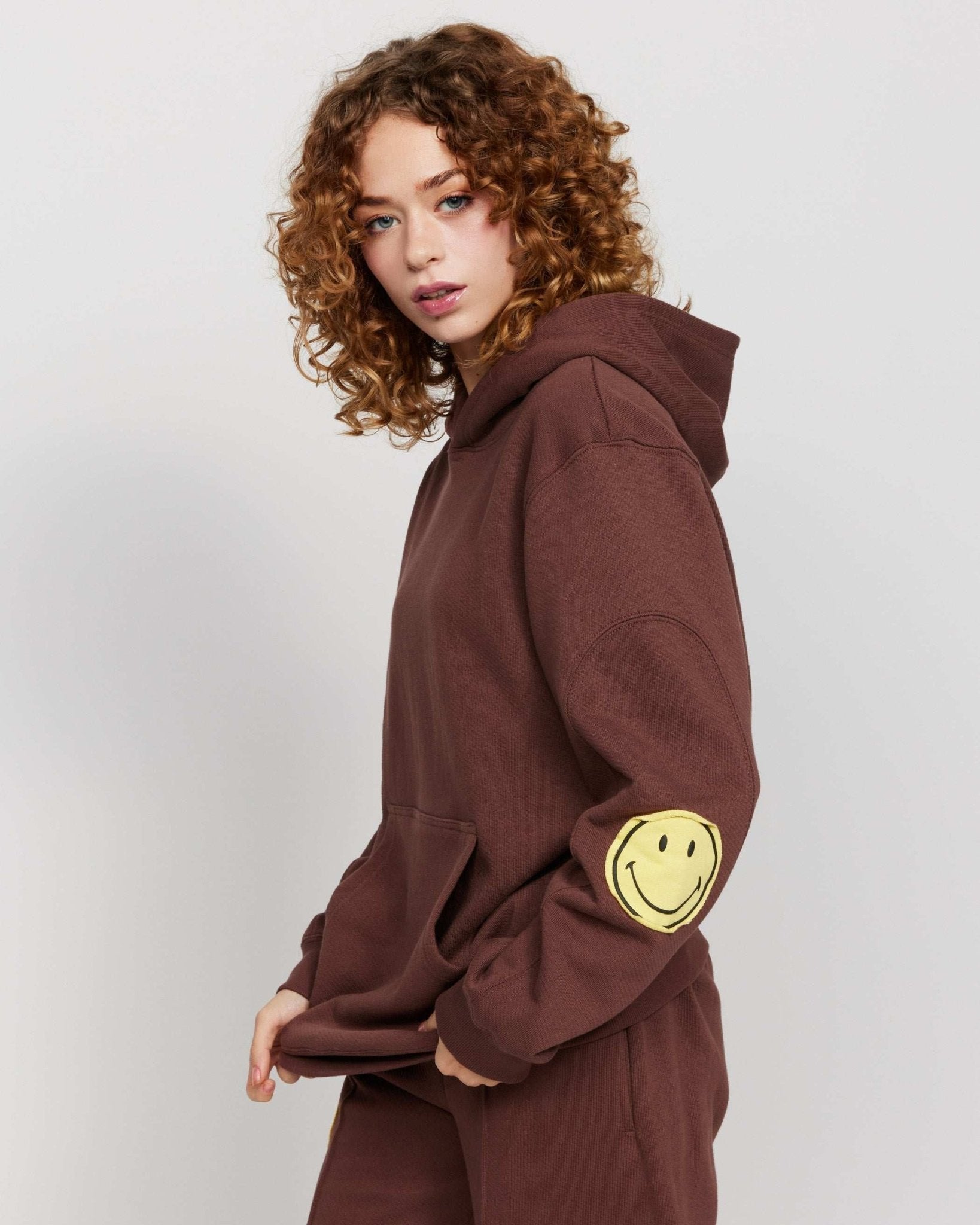 Shop Samii Ryan Samii Ryan Smiley® Oversized Hoodie Hooded Sweatshirt for women – premium loungewear and festival fashion at Spoiled Brat