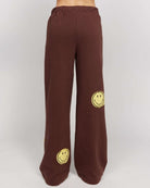 Shop Samii Ryan Samii Ryan Smiley® Straight Leg Jogger Pants Jogger Bottoms for women – premium loungewear and festival fashion at Spoiled Brat