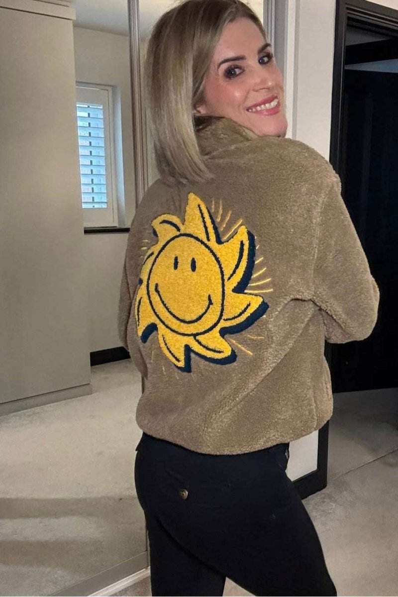 Shop Samii Ryan Samii Ryan Smiley® Sunshine Sherpa Jacket as seen on Sarah Jayne Dunn Jacket for women – premium loungewear and festival fashion at Spoiled Brat