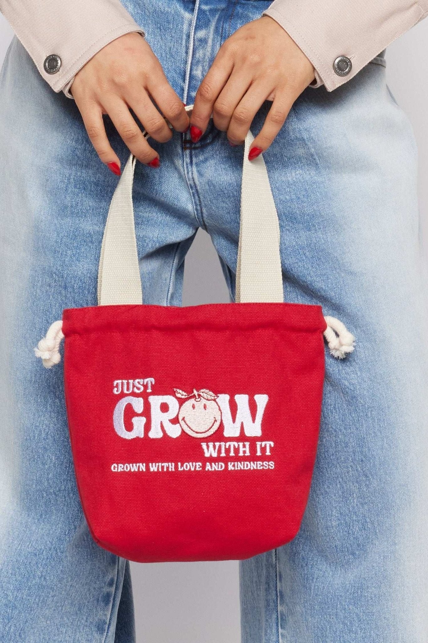 Shop Samii Ryan Samii Ryan x Smiley® Just Grow With It Bucket Bag Clutch Bag for women – premium loungewear and festival fashion at Spoiled Brat