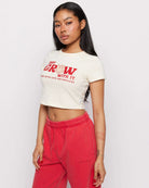 Shop Samii Ryan Samii Ryan x Smileyworld® Just Grow With It Baby Tee T-Shirt for women – premium loungewear and festival fashion at Spoiled Brat