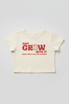 Shop Samii Ryan Samii Ryan x Smileyworld® Just Grow With It Baby Tee T-Shirt for women – premium loungewear and festival fashion at Spoiled Brat