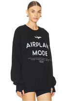 Shop The Laundry Room The Laundry Room Airplane Mode Sweater as seen on Chloe Meadows Jumper for women – premium loungewear and festival fashion at Spoiled Brat