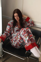 Shop The Laundry Room The Laundry Room Happy Coca - Cola Holidays Silky PJ Set Pyjamas for women – premium loungewear and festival fashion at Spoiled Brat