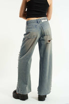 Shop The Ragged Priest The Ragged Priest Dirty Wash Distressed Release Stud Jeans Boyfriend Jeans for women – premium loungewear and festival fashion at Spoiled Brat
