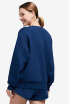 Shop Wildfox Wildfox 90s Crest Cody Sweatshirt Jumper for women – premium loungewear and festival fashion at Spoiled Brat