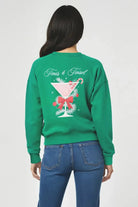 Shop Wildfox Wildfox Christmas Tinis & Tinsel Keely Raglan Sweatshirt Hooded Sweatshirt for women – premium loungewear and festival fashion at Spoiled Brat