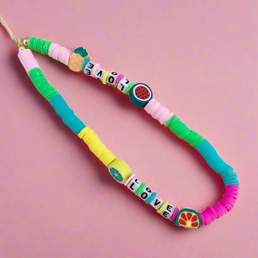 Shop Bracha Bracha Fruit Mix Phone Chain Phone Case for women – premium loungewear and festival fashion at Spoiled Brat