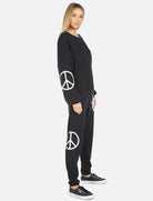 Lauren Moshi Gia Skull Peace Hand Jogger Pants Jogging Pants by Lauren Moshi as seen on celebrities