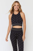 Shop Spiritual Gangster Spiritual Gangster High Neck Jacquard Seamless Black Sports Bra as seen on Miranda Cosgrove Vest Top for women – premium loungewear and festival fashion at Spoiled Brat