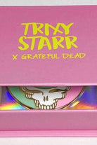Shop Trixy Starr Trixy Starr x Grateful Dead Pastel Stealie Necklace Necklace for women – premium loungewear and festival fashion at Spoiled Brat