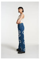 Shop The Ragged Priest The Ragged Priest Peace Printed Dad Jeans as seen on Chloe Sims Boyfriend Jeans for women – premium loungewear and festival fashion at Spoiled Brat